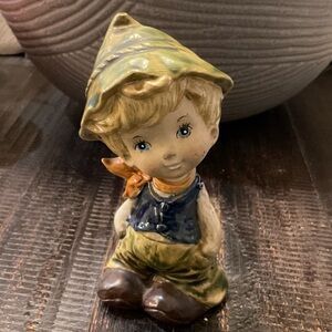 Charming Ceramic Figurine with Green Hat and Blue Vest